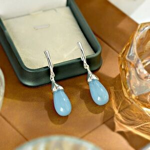 Sterling Silver Drop Earrings with Pale Blue Teardrop Stones